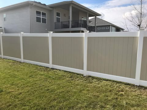Modern vinyl privacy fence behind Des Moines home